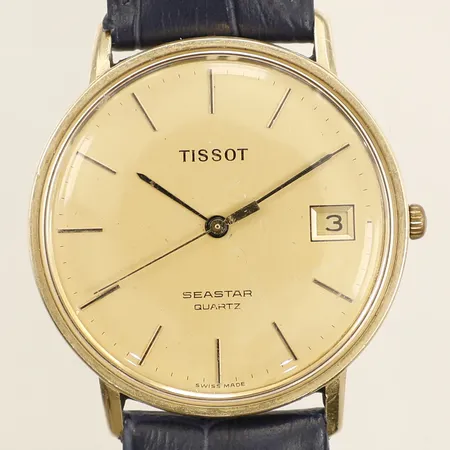 Herrur Tissot Seastar guld quartz Ø33mm länderband 24cm inklusive boetten repig batteribyte krävs 14K