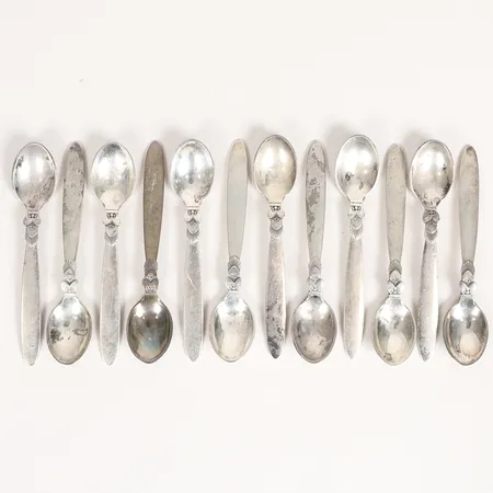 Tolv kaffeskedar modell Cactus, Gundorph Albertus för Georg Jensen, längd 89mm, stämplade Hovjuvelerare G.A. Dahlgren AB, Malmö 1943, silver 925/1000 Vikt: 121,3 g