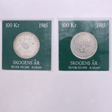 2 Minnesmynt 100kr Ø32mm, Skogens år 1985, plastetuier silver 925/1000 Vikt: 32 g