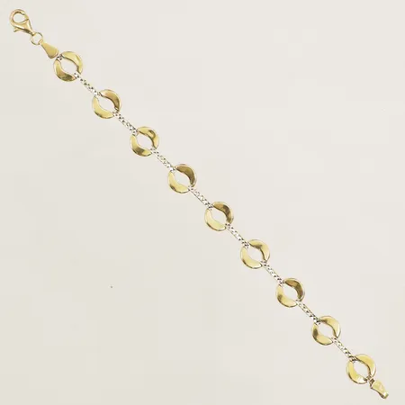 Armband tvåfärgad längd 18cm bredd 10 buckliga länkar 18K Vikt: 7,5 g