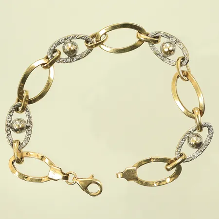 Armband tvåfärgad längd 20cm bredd 10mm, ojämn & bucklig, 14K 5,2g Vikt: 5,2 g