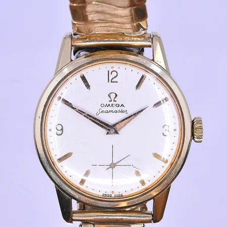 Herrur Omega Seamaster liten sekundvisare manuell Ø35mm flexiband stål.