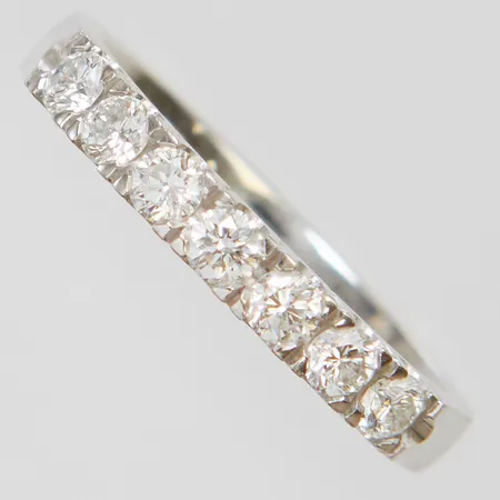 Alliansring med diamanter 7 x ca.0,07ct, stl:17½, bredd: 2,9mm, ograverad, vitguld, 18K Vikt: 4,3 g