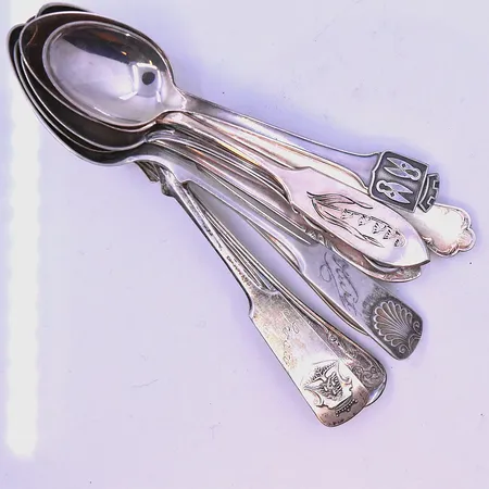 9 udda skedar silver 830/1000. Vikt: 112,7 g