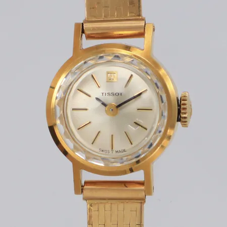 Damur Tissot 18K, manuell, 17mm, armband 18K ca 16cm, bruttovikt 24,8g 