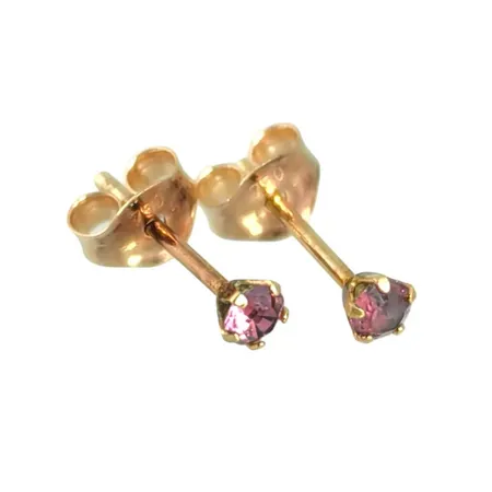 Örhängen i 18K guld med rosa stenar, örhängenas diameter 2,7 mm, originalploppar, stenar utan anmärkning Vikt: 0,4 g
