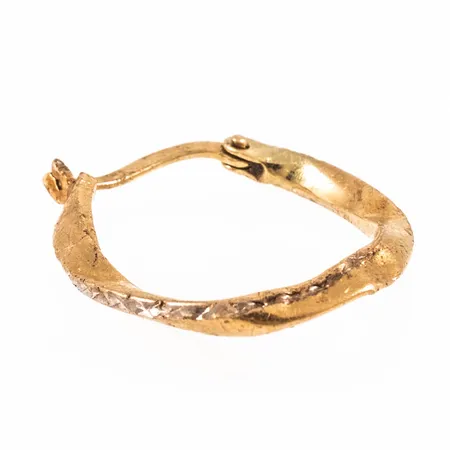 En udda creol bucklig 18K 0,6g.