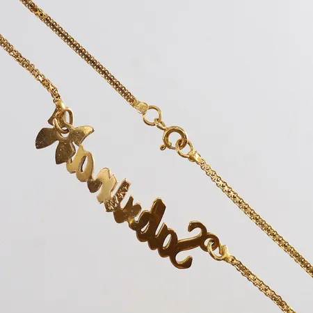 Collier med namnbricka defekt 21K.  Vikt: 6,8 g
