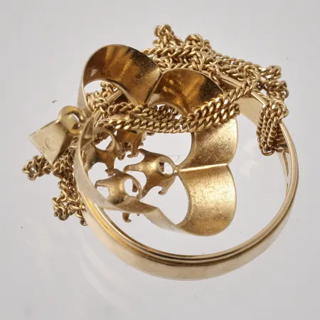 Diverse defekt guld, 18K, 10,68g.