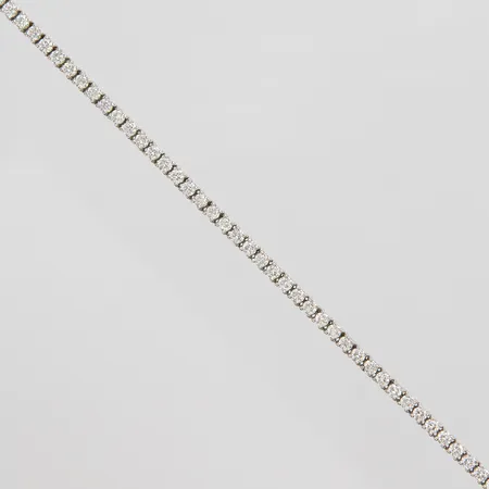 Rivièrearmband med diamanter 58 x ca.0,05ct, ca.W-TCr (H-I)/SI, längd: 17cm, bredd: 2,8mm, vitguld, 18K Vikt: 9,9 g
