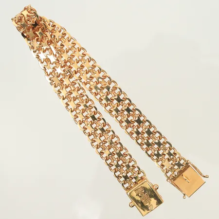 Armband X-länk längd 18,5cm, bredd 10mm, stämplad BHG, något trög i lås, 18K, 20,3g Vikt: 20,3 g