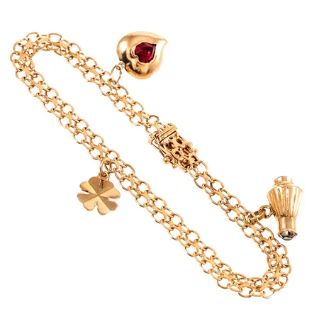 Armband X-länk med tre berlocker längd 19cm bredd 5,4mm, 18K 8,1g. 