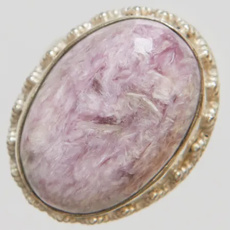 Ring med lila sten stl:18¼ bredd:4-25mm, silver 925/1000 Vikt: 9,7 g