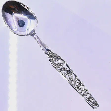12 skedar modell Rosenranka längd 10cm silver 830/1000. Vikt: 94,7 g