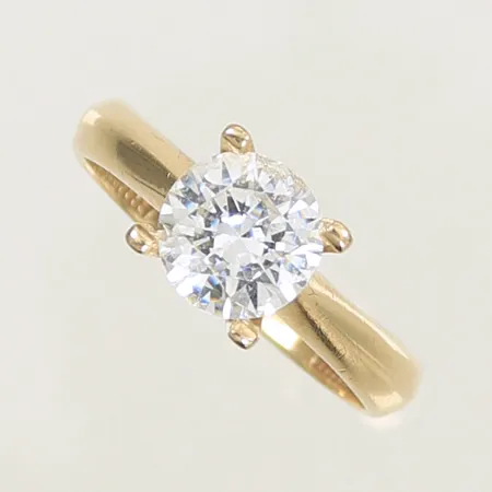 Ring med vit sten, stl 17 bredd 4-7mm, 14K 2,8g totalt