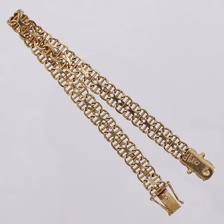 Armband X-länk med stav längd: ca 18,5cm bredd: ca 7mm otydlig tillverkarstämpel år 1966 svensk kontroll stämpel 18K Vikt: 12,3 g