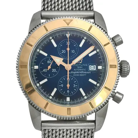 Herrur Breitling SuperOcean Heritage Chronograph, stål/guld, Ø46 mm, automatisk, kronometer, kaliber 13 (ETA 7750), serienummer 2661590, referensnummer U13320, meshlänk, handledsmått max 20 cm, defekt krona - går ej att skruva in, cert, chronometercert, manual, 2013, box, halv ytterkartong, bruksmärken, Skickas med postpaket.