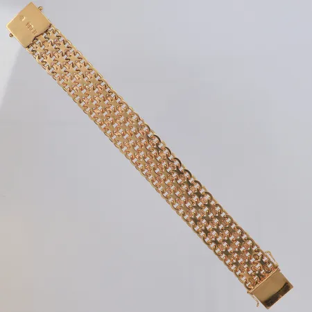 Armband X-länk längd 18,5cm, bredd 19,8mm, Esto Ab Guldvarufirman Stockholm 1963, vassa detaljer vid lås, 18K  Vikt: 62,9 g