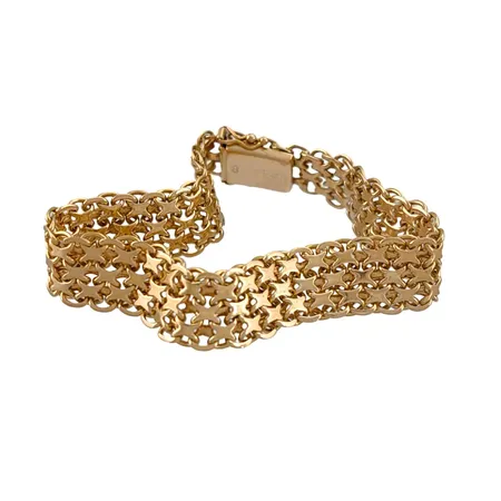 Armband X-länk i 18K guld, treradig modell, otydlig tillverkarstämpel, Stockholm, svensk kontrollstämpel, längd knäppt 19,0 cm, bredd 11 mm Vikt: 19 g