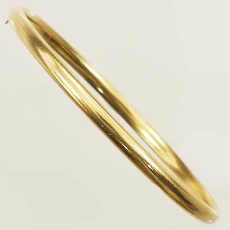 Stelt armband Ø62mm bredd 4mm, innermått ca 19cm öppningsbar 18K  Vikt: 6,8 g