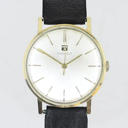 Herrur Tissot Ø34mm, repigt glas, läderband, boett i 14K Bruttovikt: 28,4g