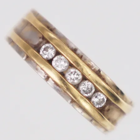 Ring diamanter 0,21ctv enligt gravyr stl:16¼, bredd 5-6mm, tvåfärgat, 18K Vikt: 4,9 g