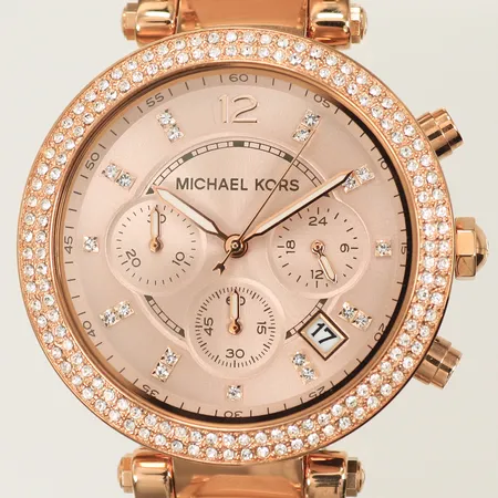 Damur Michael Kors MK-5896 Ø39mm,  Quartz med länk, vita stenar på index och glasring, batteribyte krävs. omkrets handled 19cm.