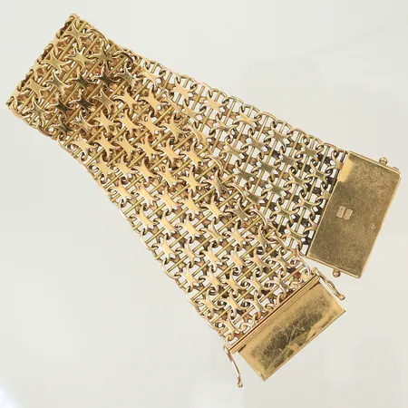 Armband X-länk med stav längd 19,5cm, bredd 28mm, något skeva länkdelar, slapp i lås, 18K, 53,2g Vikt: 53,2 g