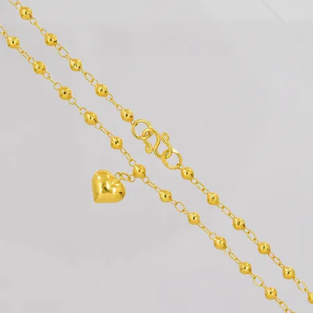 Collier med berlock längd 40cm bredd ca 3mm Thaiguld ¼ Bhat 23K Vikt: 3,8 g
