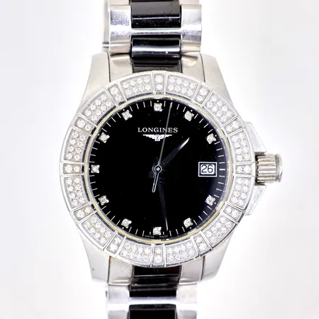 Damur Longines Conquest quartz , stål, 35mm, refnr: L3.280.0.57.7 , serienr: 38528885, diamantkrans 0,532ctv Tw/VVS, diamantindex 0,044ctv H/VS, fungerar, garantibevis, diamant certifikat, instruktionsbok, låda, box, extra länkbitar.