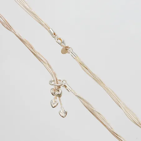 Flerradigt collier med integrerade hjärtan längd 47,5cm, bredd ca 5mm, silver 925/1000 Vikt: 23,4 g