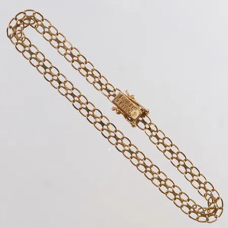 Armband X-länk längd 18,5cm bredd 4,5mm ojämn 18K.  Vikt: 4,1 g