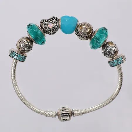 Armband Pandora med 9 berlocker längd: ca 18,8cm bredd: ca 2-15mm 925/1000 silver Vikt: 37,9 g