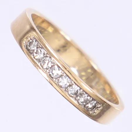 Ring med diamanter 8xca 0,02ct stl:17¾ bredd 3mm, svenska stämplar, gravyr, 18K Vikt: 3,3 g
