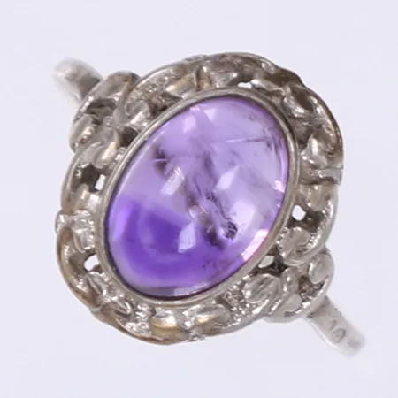 Ring med lila sten stl:17¼ bredd 1-14mm silver 830/1000 Vikt: 2,3 g