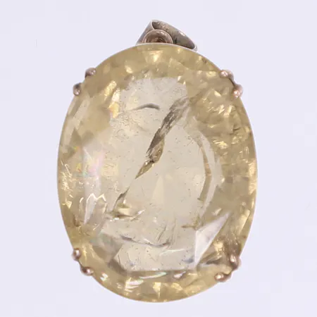 Hänge med gul sten 26x16mm, nagg i sten, ostämplat silver  Vikt: 6,8 g