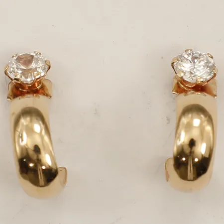 Ett par örhängen med vita stenar Ø8mm ojämna/skeva 18K Vikt: 1 g