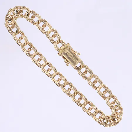 Armband Bismarck 19cm bredd 7mm, svenska stämplar, ena låsåttan något trög, 18K  Vikt: 15,7 g