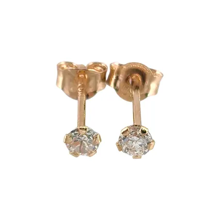 Örhängen i 18K guld med vita stenar, örhängenas diameter 2,7 mm, originalploppar, fint skick, stenar utan anmärkning Vikt: 0,3 g
