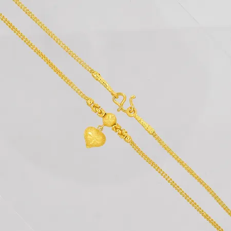 Collier med hjärta längd 42cm bredd ca 2mm Thaiguld ½Bhat 23K Vikt: 7,6 g