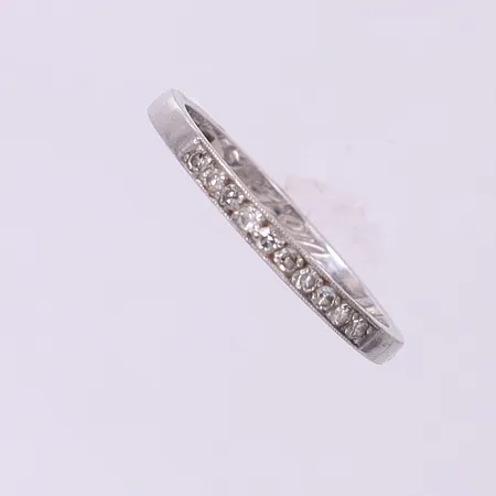 Alliansring med diamanter 10 x ca 0,01ct stl:17, bredd 1,9mm, gravyr, Hans Strömdahl AB, Stockholm 1977, palladium. Vikt: 1,6 g