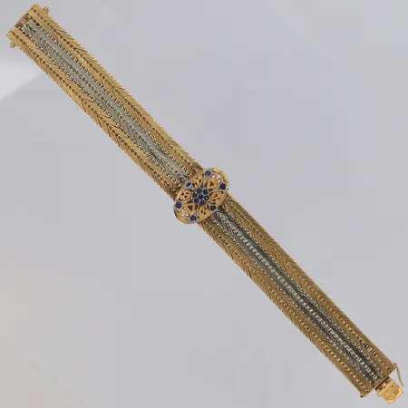 Armband Korridor tvåtonat med 13 stycken safirer, oval dekoration,längd ca 19,3cm, bredd 17mm, italienska stämplar ca 1950-1960-tal, tillverkad i Milano 529, 18K Vikt: 58,1 g