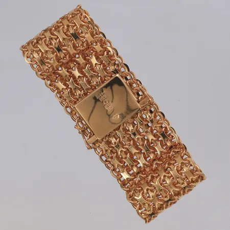 Armband X-länk längd 18,5cm, bredd 27,4mm, Stockholms Stads Arbetsvårdsbyrå Stockholm 1972, 18K  Vikt: 63 g