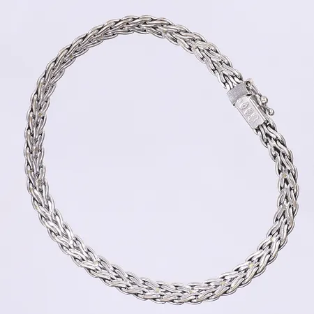 Armband flätad modell 19,5cm bredd 5mm, vitguld, kistlås, 18K Vikt: 15 g
