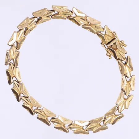 Armband 18,5cm bredd 7mm, kistlås, bruksslitage, 18K Vikt: 12,4 g