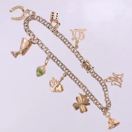 Armband Bismarck med berlocker, längd 19,5cm bredd 3,5mm, två monogramberlocker, en berlock 14K. 18K bruttovikt 12,8g 