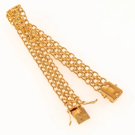 Armband X-länk längd 20,8cm bredd 11mm, 18K 25,0g. 