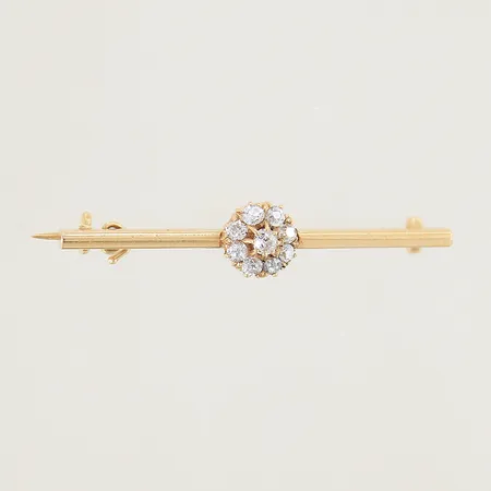 Brosch med gammalslipade diamanter 1 x ca 0,05ct 8 x ca 0,03ct 8x39mm 18K Vikt: 4,1 g