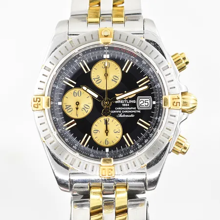 Herrur Breitling Chronomat Evolution stål/guld, automat, Ø44mm, kronograf, refnr B13356, serienr 2390456, cal. B13 (ETA 7750), datum, safirglas, pilotlänk stål/guld, viklås, årsmodell troligen 2008, bruksslitage, inga tillbehör.
