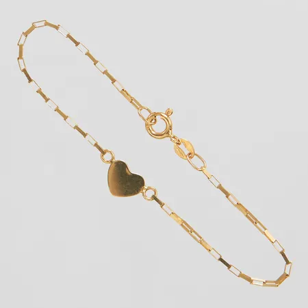 Barnarmband med integrerat hjärta, längd: 14,3cm, bredd: 1,2-6,1mm, 18K Vikt: 1,2 g